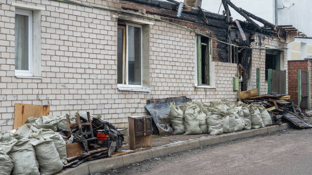 Professional Fire Damage Restoration technician working in Pease, MN